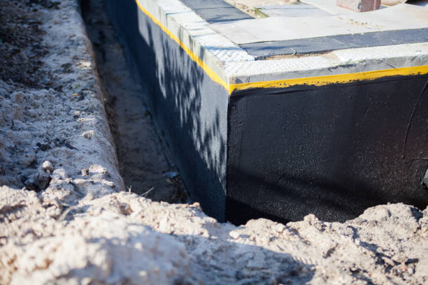 Professional Exterior Waterproofing technician working in Akron, AL